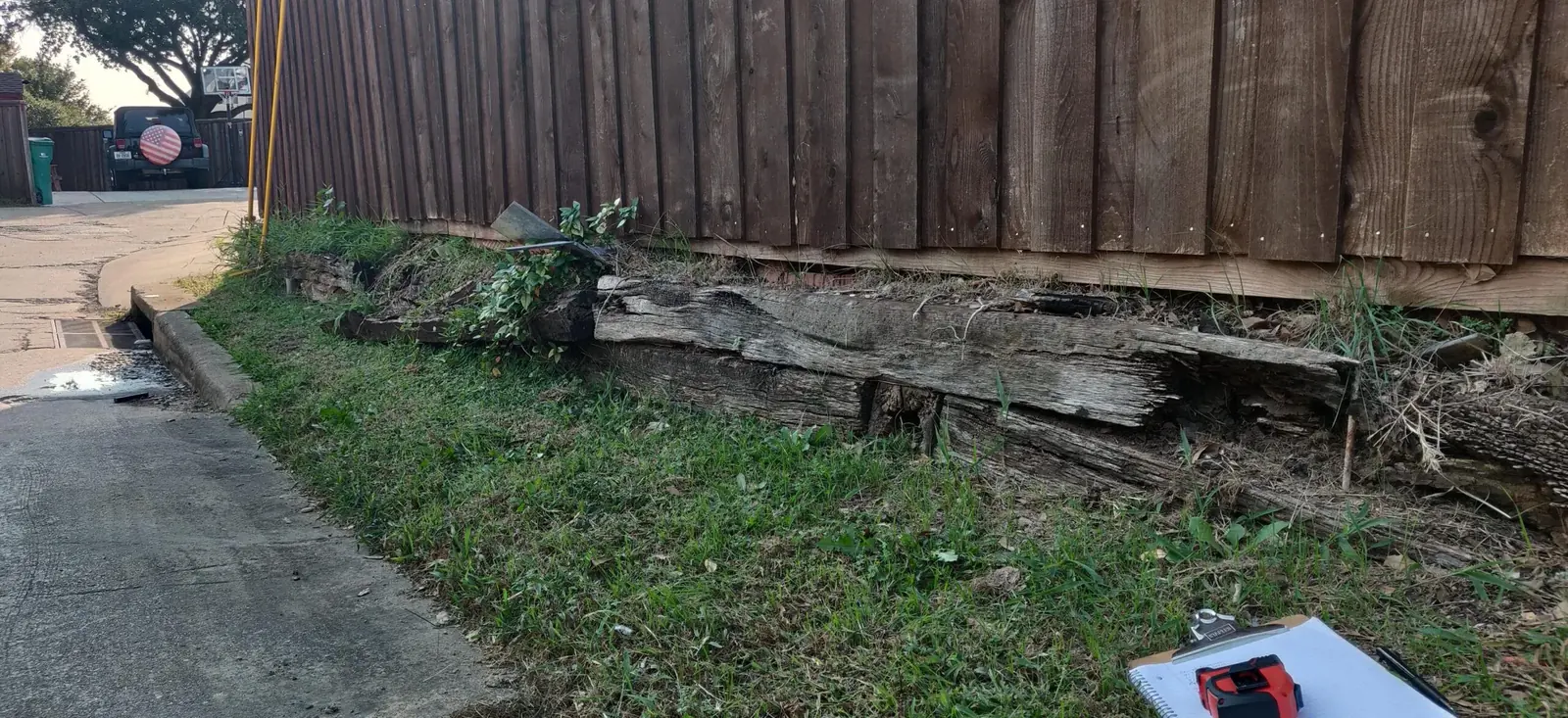 Replaced cross tie retaining wall with milsap stone in Lewisville