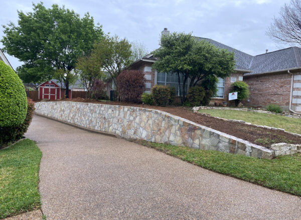 Replaced wood cross tie retaining wall with Milsap Stone in Bedford ...