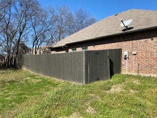 Before Installed milsap stone wall to level out side yard to support foundation Lake Dallas Texas