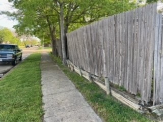 Before Replaced wood wall with Milsap stone wall in Carrollton Texas-min