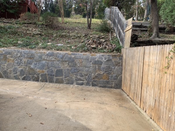 Replaced failing wood wall in Fort Worth with Stonewall. stone is called Silver Mist Hackett (2)-min