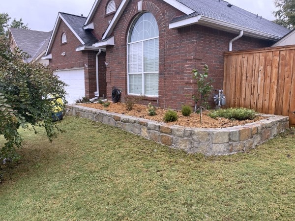 Replaced a cross tie wall with a milsap stone in Carrollton Texas
