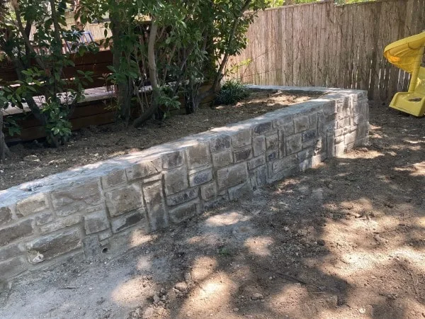 Rebuilt Retaining Wall with Existing Stone Material (1) Rebuilt Retaining Wall with Existing Stone Material (1)