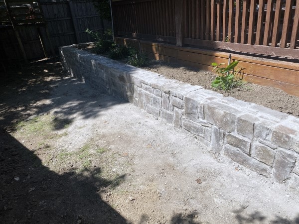 Rebuilt Retaining Wall with Existing Stone Material (2)