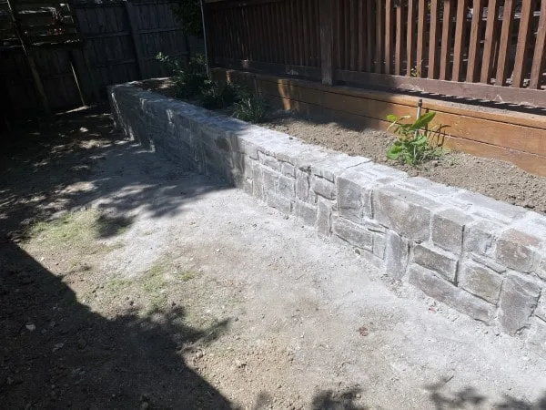 Rebuilt Retaining Wall with Existing Stone Material (2) Rebuilt Retaining Wall with Existing Stone Material (2)