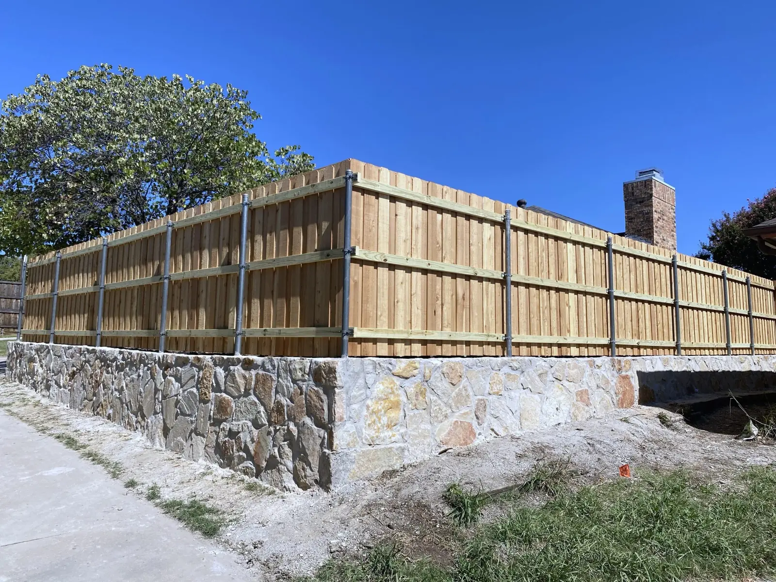 Replace Crosstie Retaining wall with Stone in The Colony Texas_Page_3