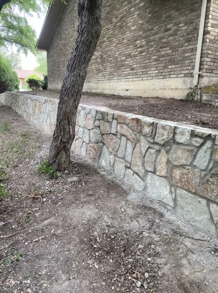 Replaced old failing cinder block wall with new milsap stone in Plano -min Replaced old failing cinder block wall with new milsap stone in Plano