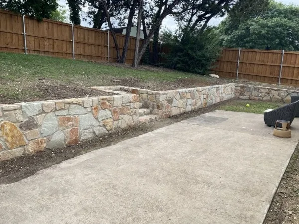 Replaced old crosstie wall in Dallas with Milsap stone wall (1) Replaced old crosstie wall in Dallas with Milsap stone wall (1)