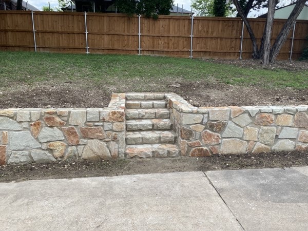 Replaced old crosstie wall in Dallas with Milsap stone wall (2)