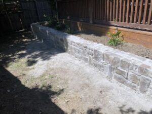 Rebuilt Retaining Wall with Existing Stone Material (2)