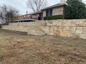 Replace Cross Tie Retaining wall with Milsap Stone in Carrollton