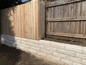 Replace Failing Wood Wall with Austin Stone