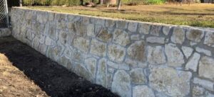 Stone retaining wall in Arlington Texas-min