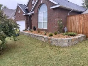 Replaced a cross tie wall with a milsap stone in Carrollton Texas