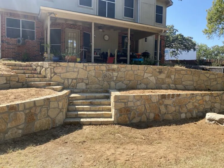 Completed natural stone retaining wall in Arlington, TX